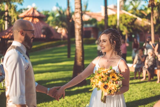 Couple enjoying DIY wedding games with guests