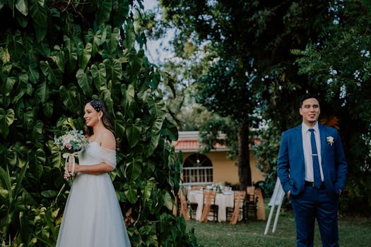 couple taking wedding photos in a beautiful outdoor setting