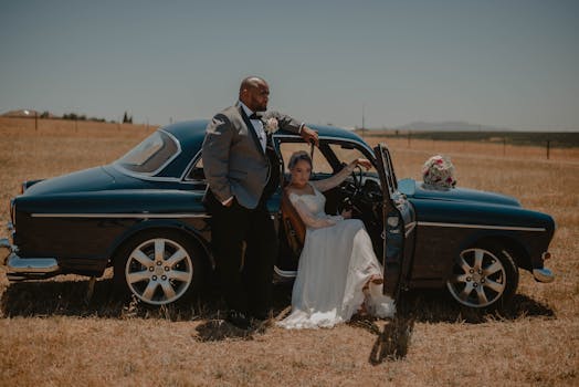 couple surrounded by flowers during a wedding shoot